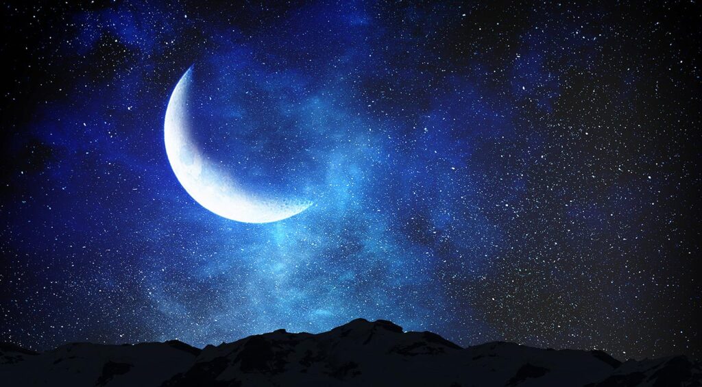Crescent Moon and Stars in Blue Night Sky